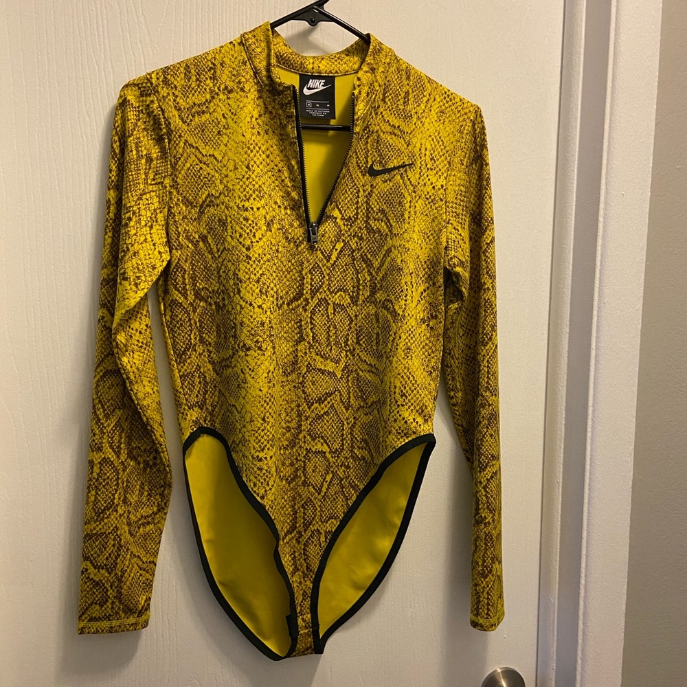 Nike body suit. Yellow snake pattern.